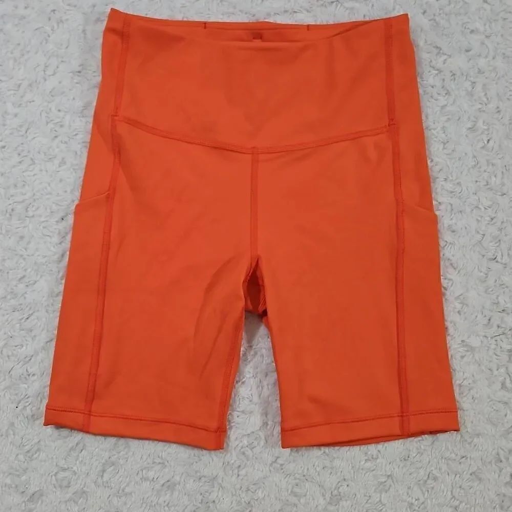 Athleta Orange Haze Ultimate Stash Pocket 7" Short women's XS bike compression